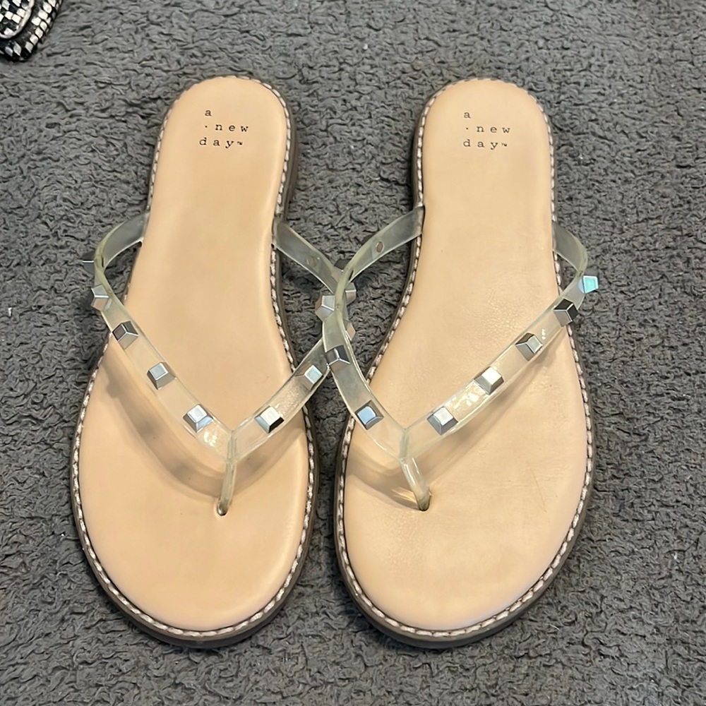 Clear studded flip flops